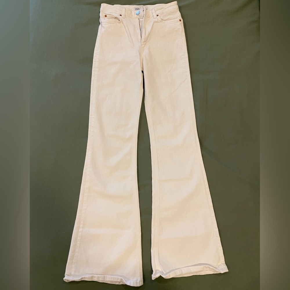 White jeans from Zara size 2. I wore them once. Bell bottom pants.